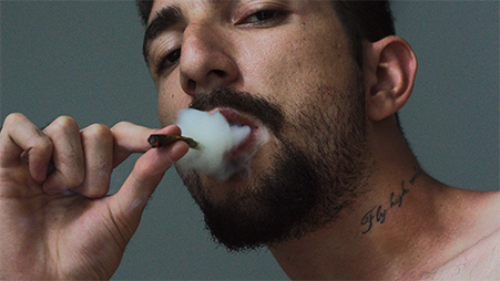 Man smoking a joint