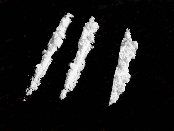 Man inhaling cocaine